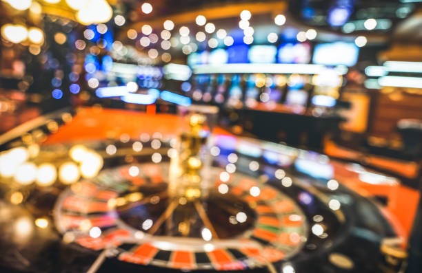 Blueprint Gaming roulette table with dealer spinning the wheel
